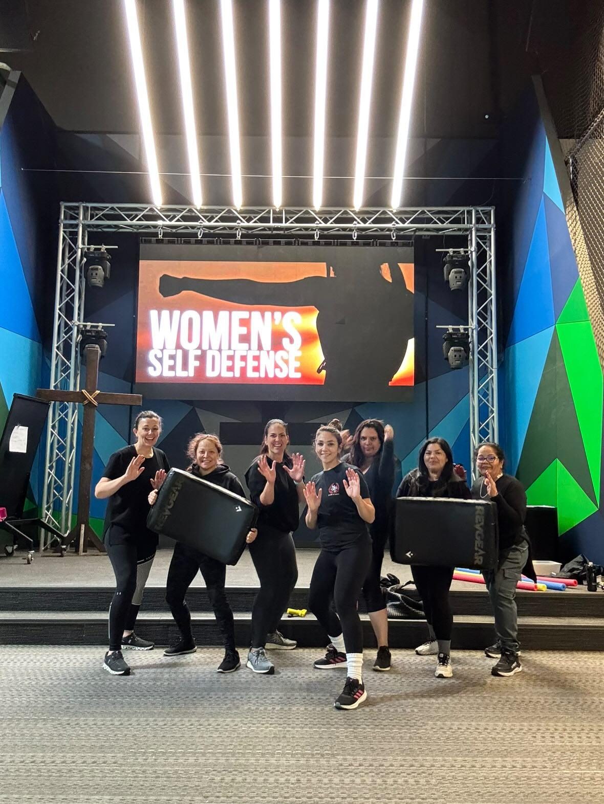 Women training together in a self-defense class